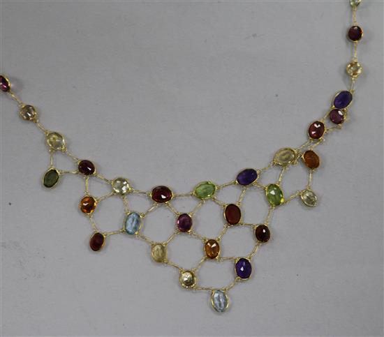 A 14ct gold and multi gem set fring necklace, 40cm.